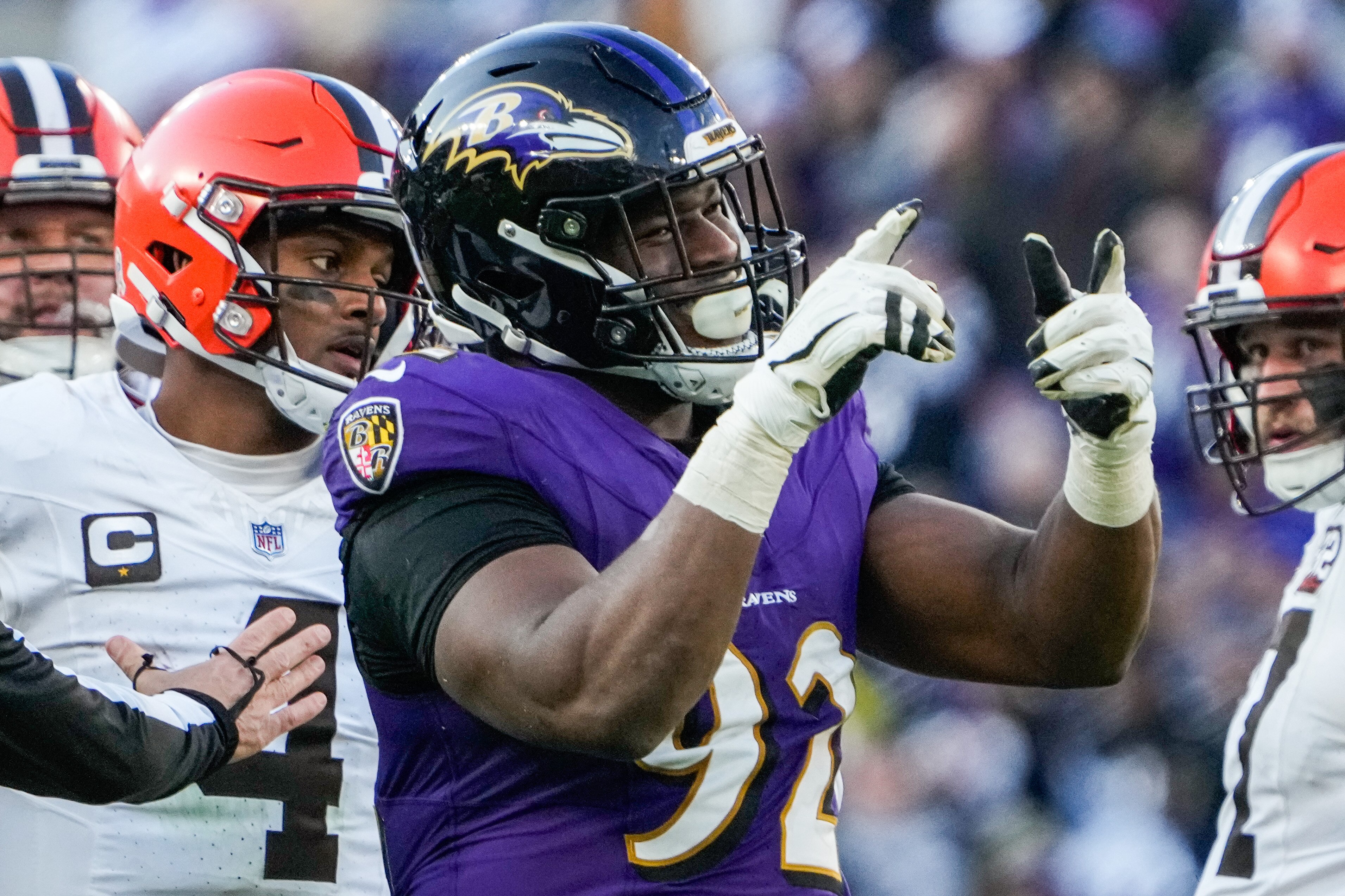 Baltimore Ravens defensive tackle Justin Madubuike (92) celebrates after sacking Cleveland Browns quarterback Deshaun Watson (4) during the fourth quarter at M&T Bank Stadium on Sunday, Nov. 12, 2023.