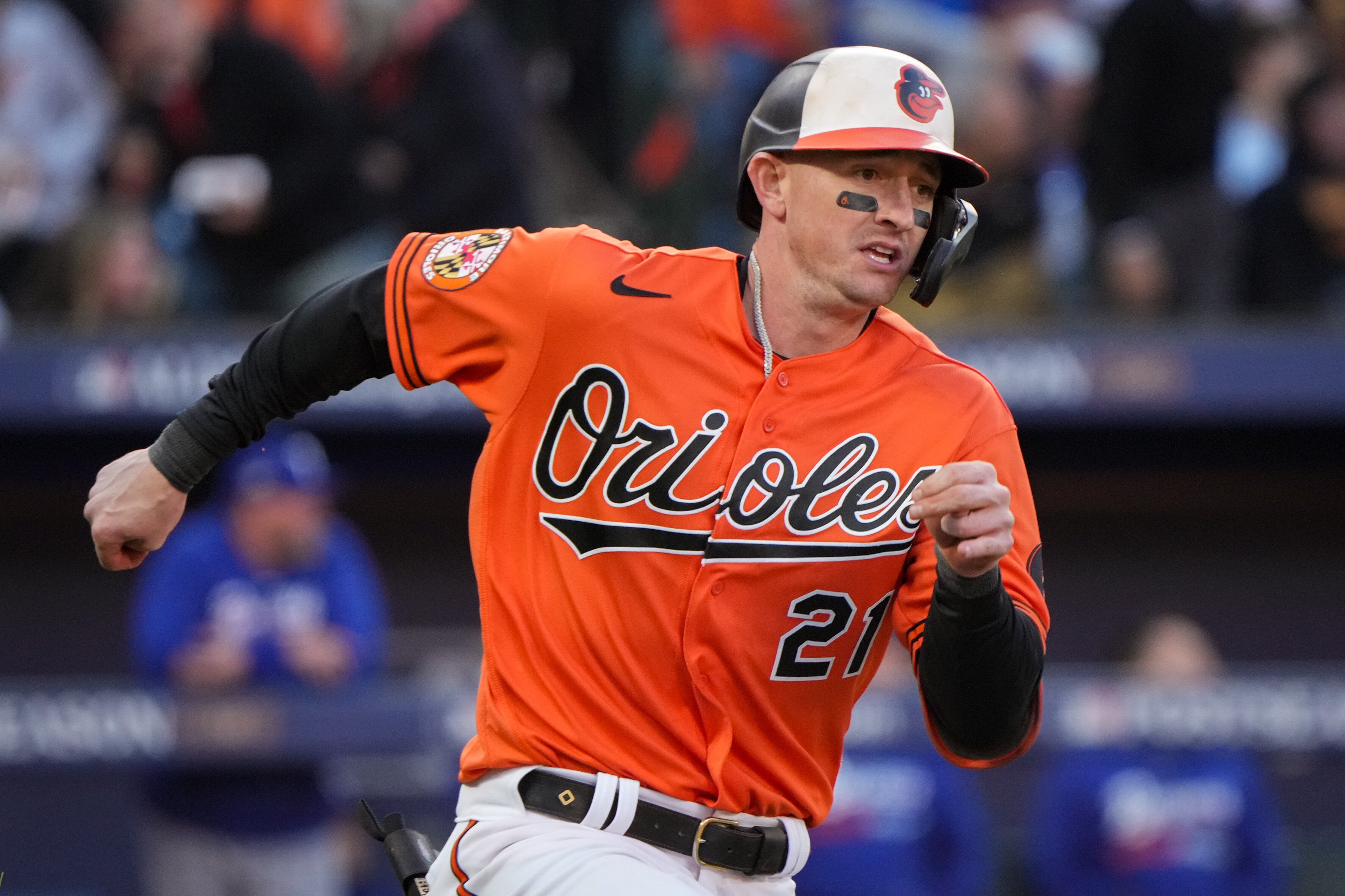 Baltimore Orioles left fielder Austin Hays sprints to first base during Game 2 of the American League Divisional Series against the Texas Rangers at Camden Yards on Sunday, October 8, 2023.