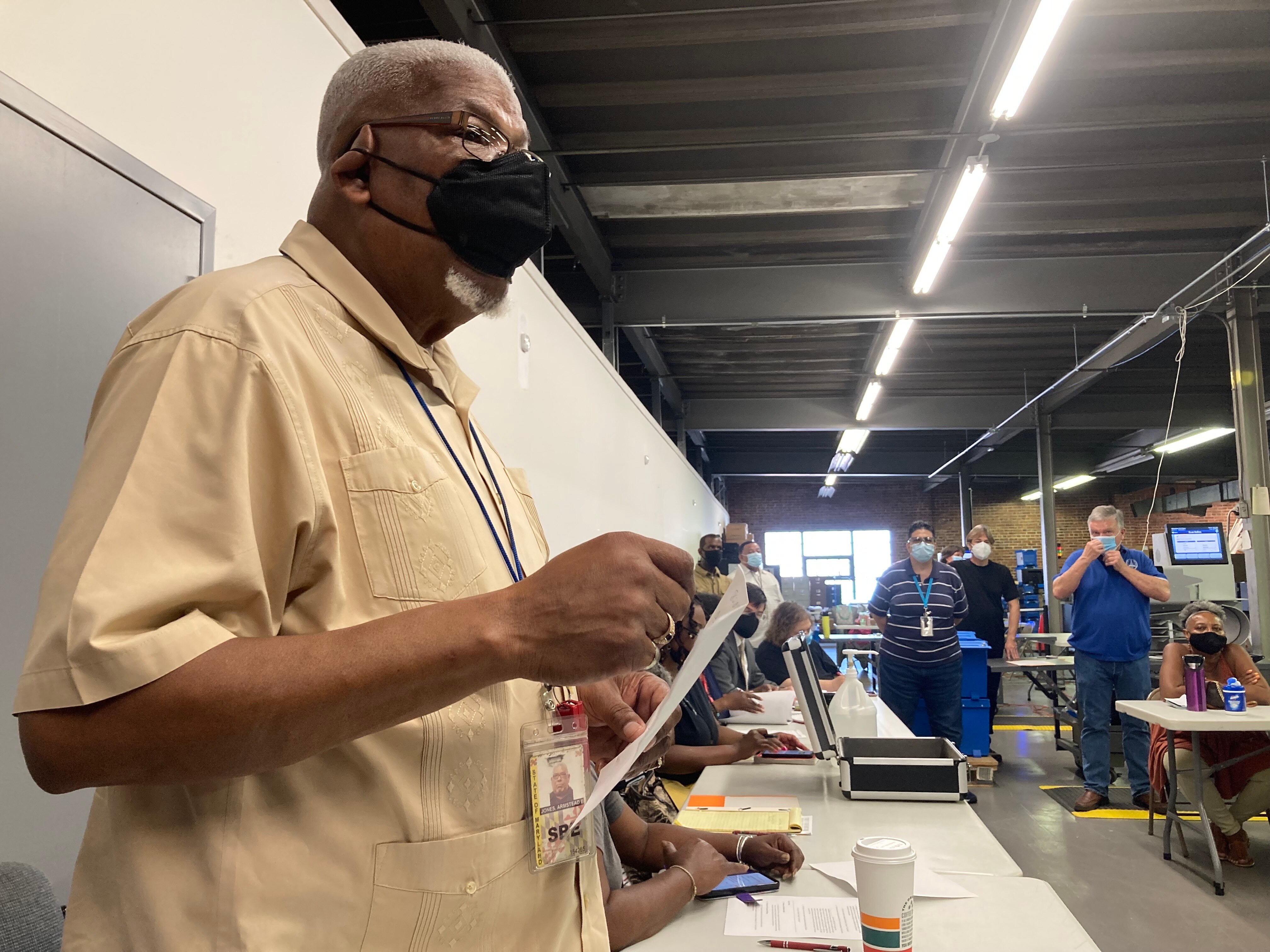 Armstead Jones, Baltimore City's elections director, speaks at the start of the canvass of mail ballots in the 2022 primary election at the city's elections warehouse.