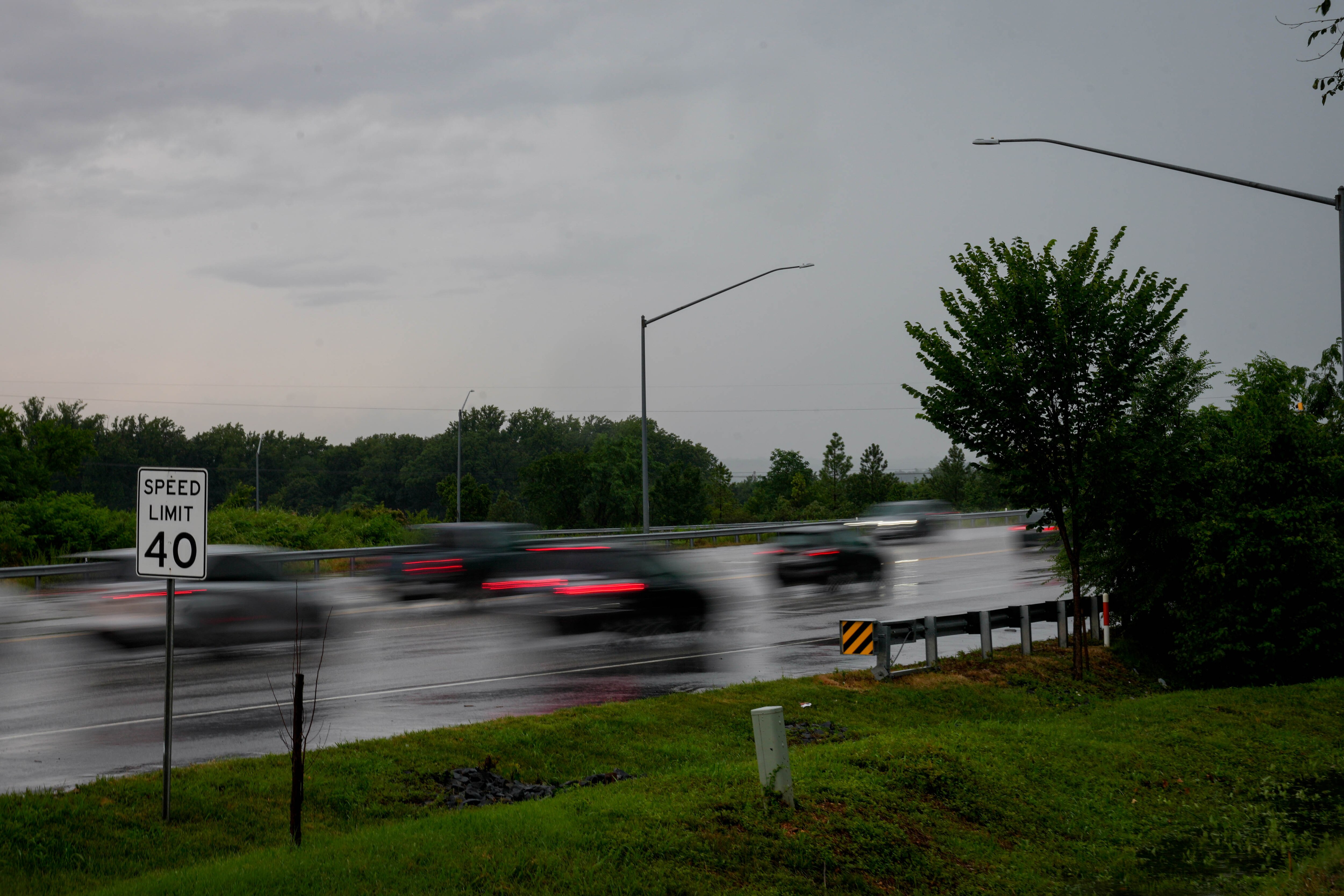Cars drive on West Nursery Road near BWI during a thunderstorm in the Baltimore, Md. region on Tuesday, July 1, 2025.