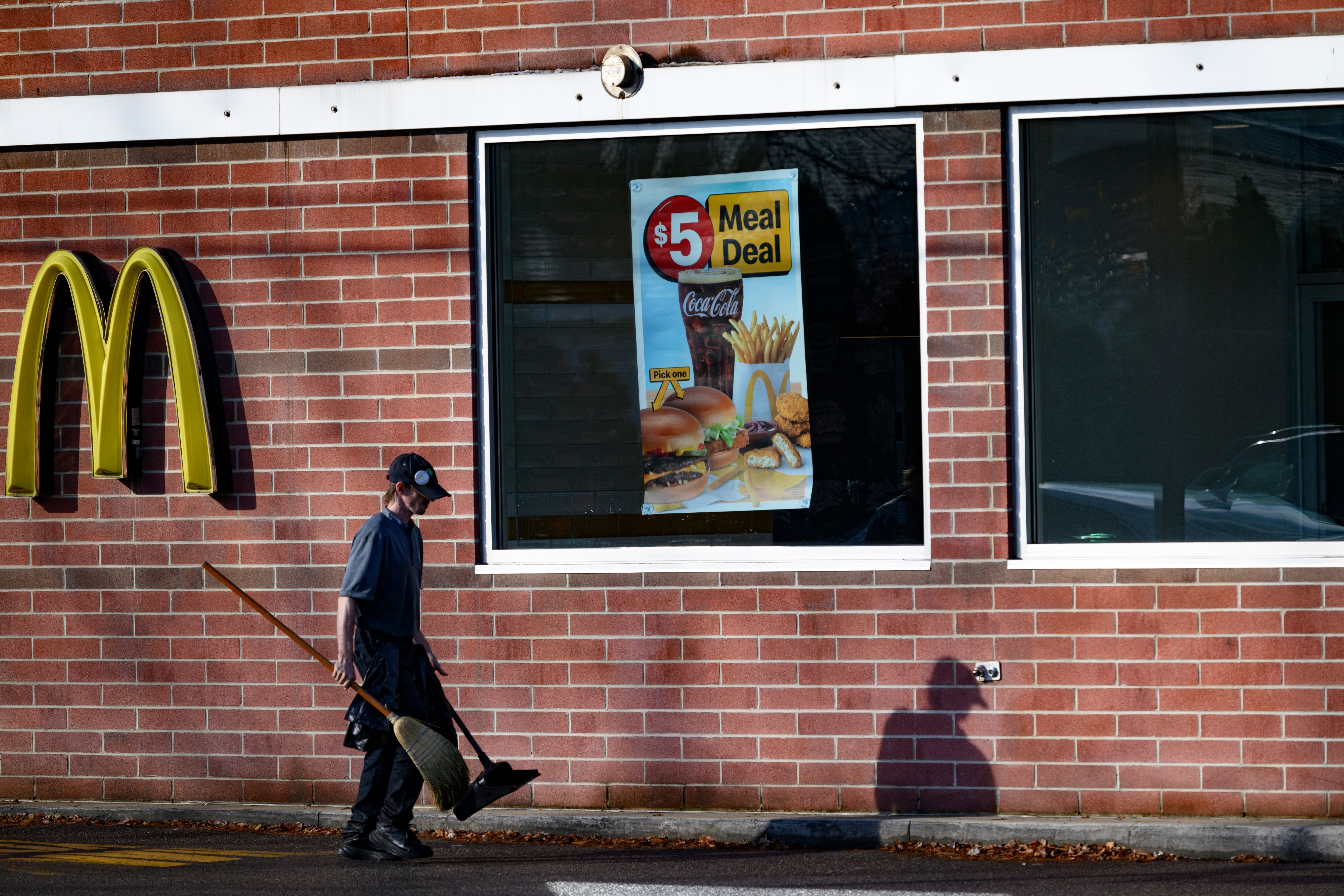 An employee walks by the Altoona McDonald’s on East Plank Road where Luigi Mangione was identified and later arrested on Dec. 9.