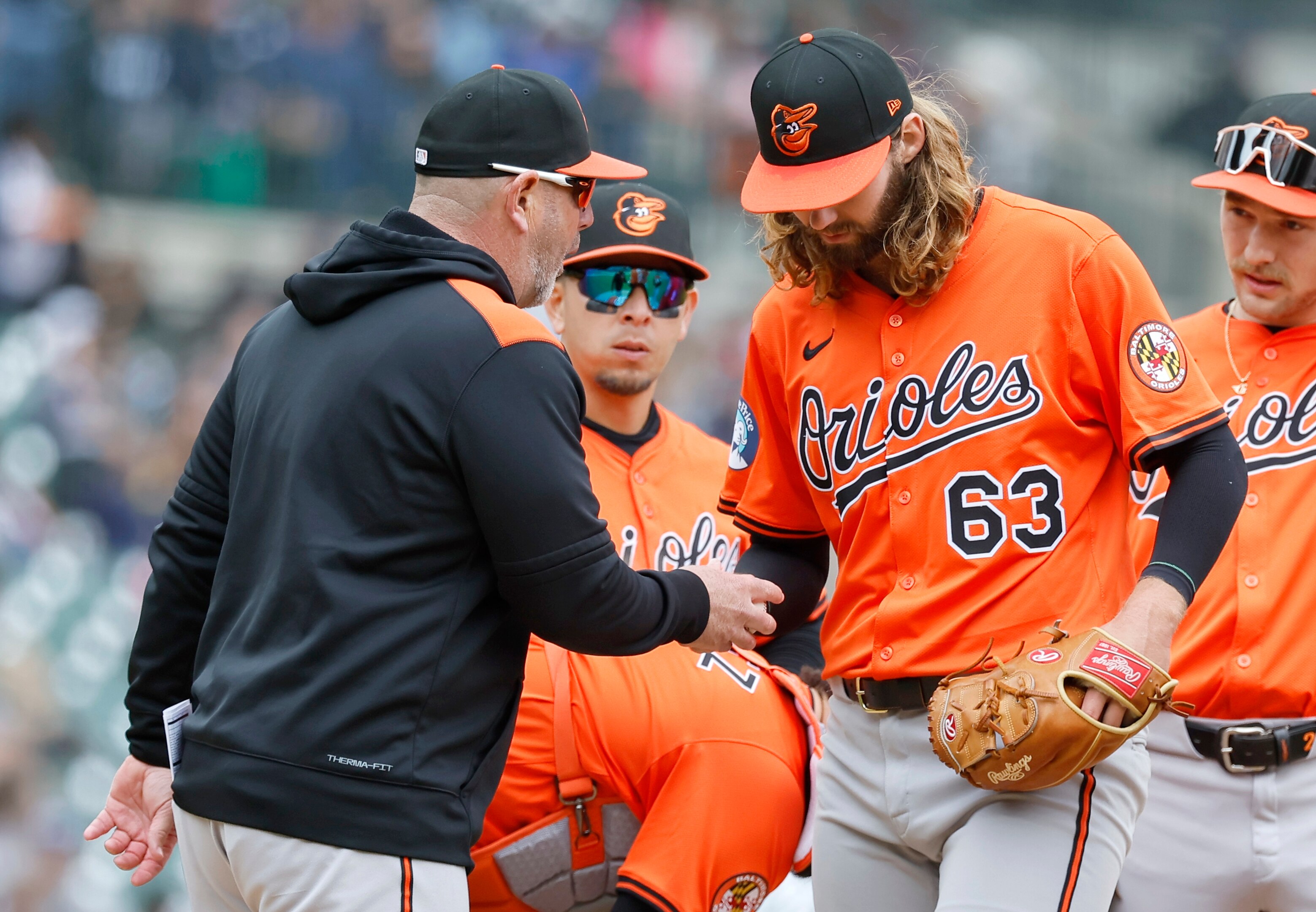 DETROIT, MI -  APRIL 26:  Starting pitcher Brandon Young #63 of the Baltimore Orioles is pulled by manager Brandon Hyde #18 during the fifth inning of game one of a doubleheader at Comerica Park on April 26, 2025 in Detroit, Michigan.
