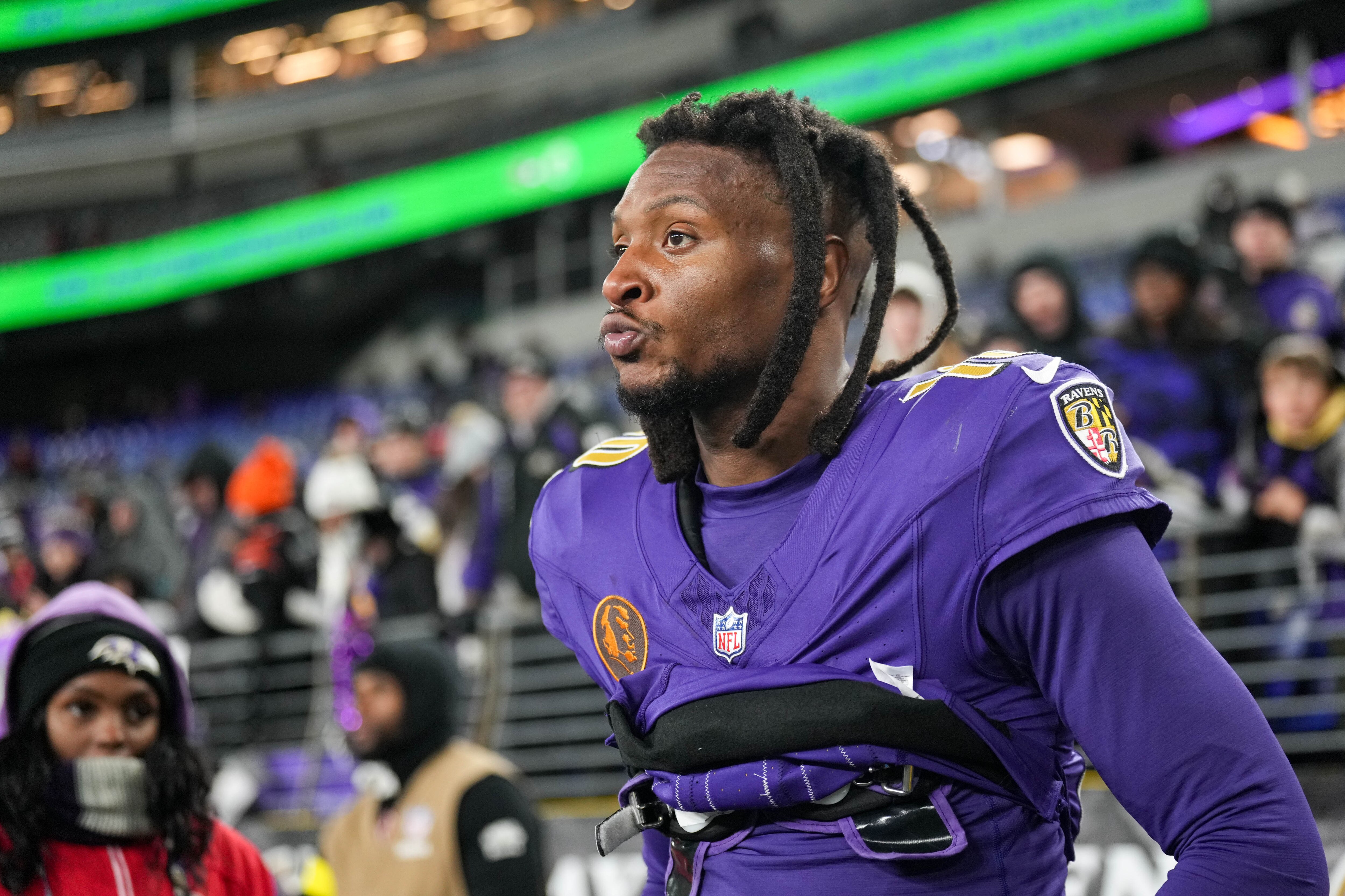 Ravens wide receiver DeAndre Hopkins looks up at the jumbotron in the fourth quarter against the Cincinnati Bengals on Thanksgiving.