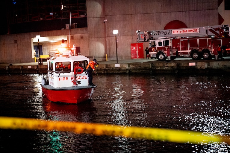 TUESDAY, NOVEMBER 18, 2025 - More than a dozen Baltimore fire trucks and police cars lined the area near the Pier 5 Hotel on Tuesday as divers and rescue boats searched for a vehicle that plunged into the water.