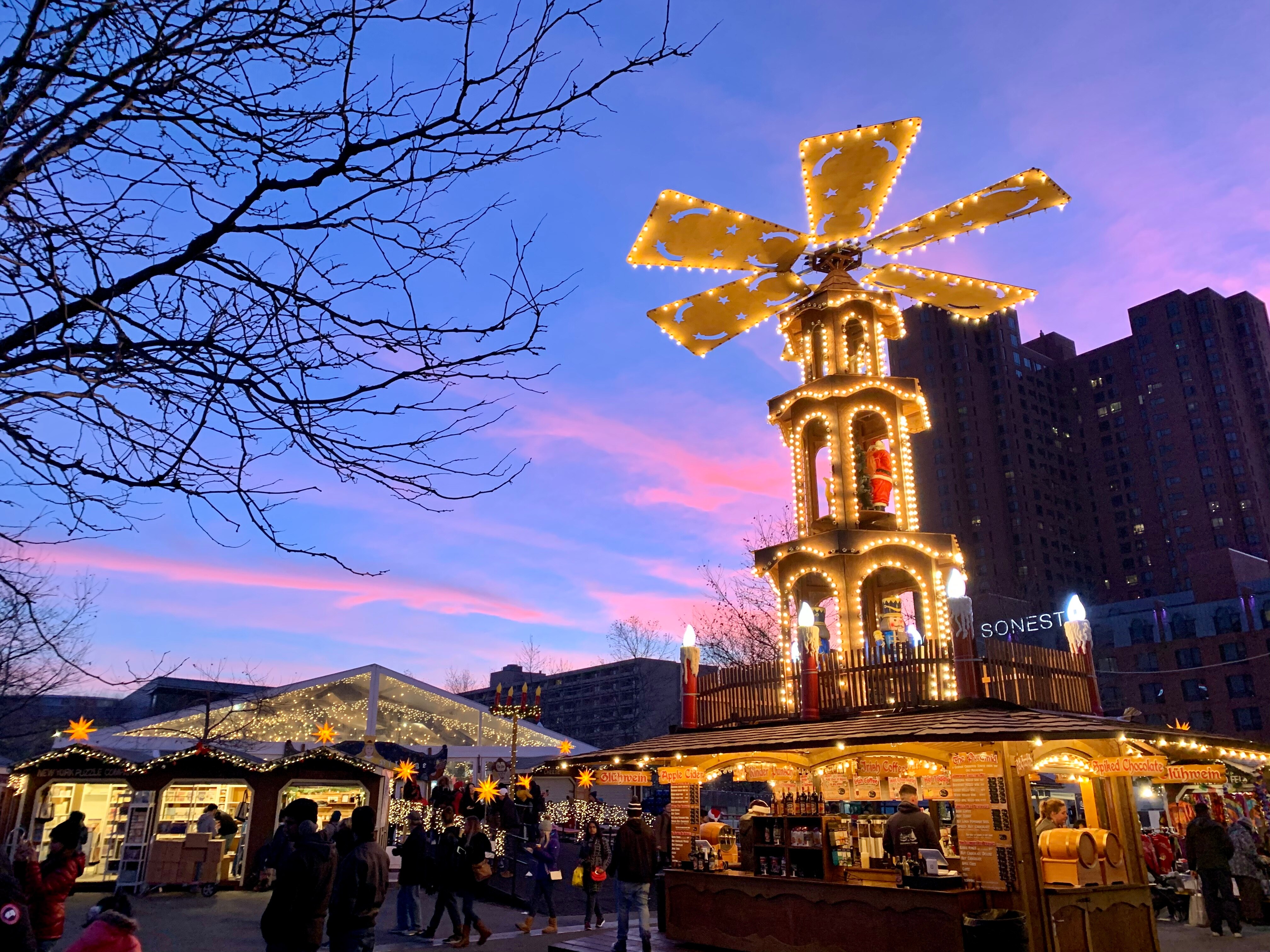 A 30-foot tall traditional Christmas pyramid in the center of a German-style Christmas market.