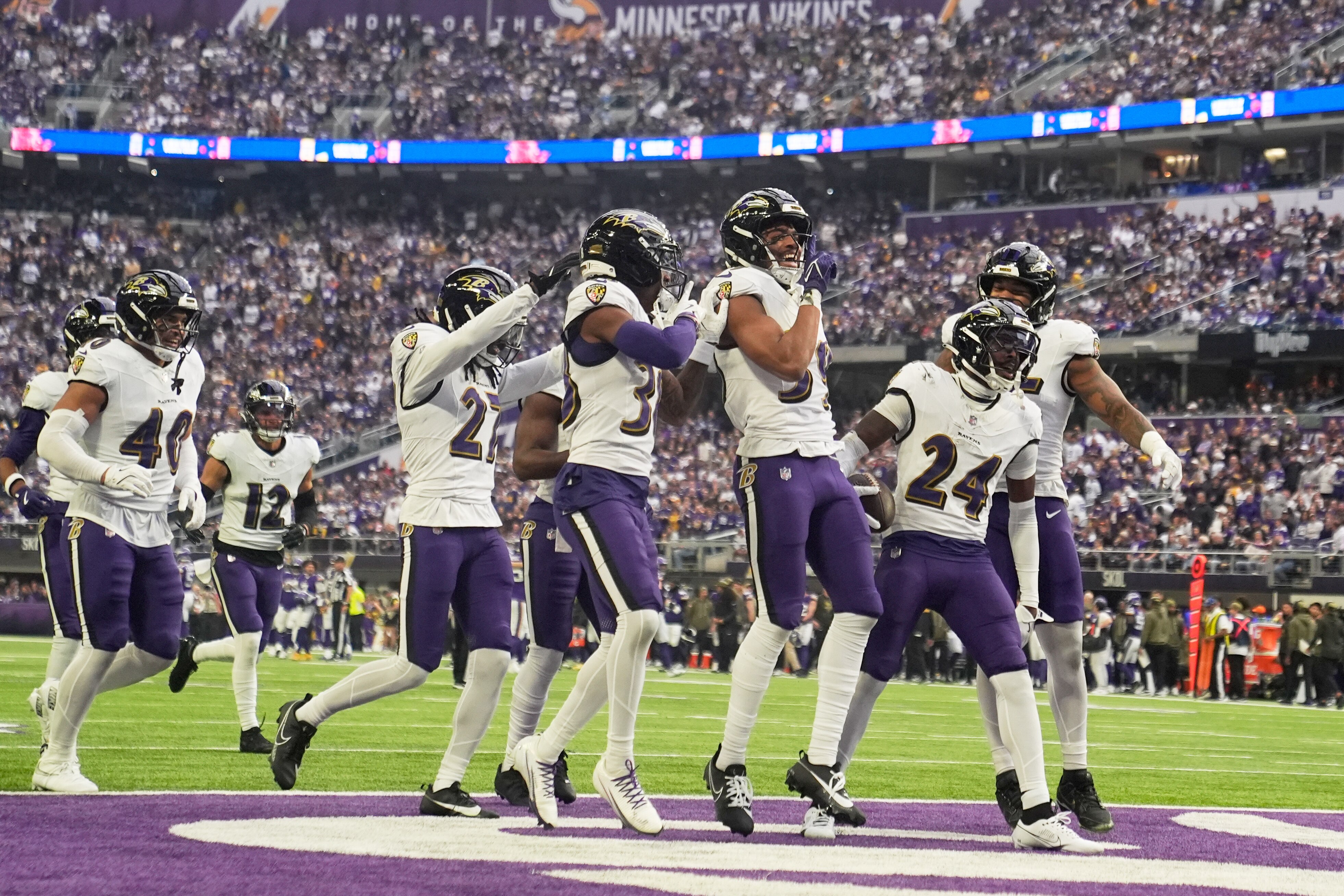 Baltimore Ravens safety Malaki Starks (24) celebrates his interception against the Minnesota Vikings in the first half of an NFL football game, Sunday, Nov. 9, 2025, in Minneapolis.