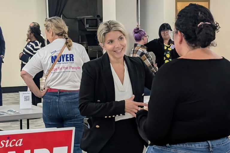 Jessica Haire, the Republican candidate for state Senate in District 30, talks with potential voters during an Oct. 6, 2026, candidate forum in Gambrills.