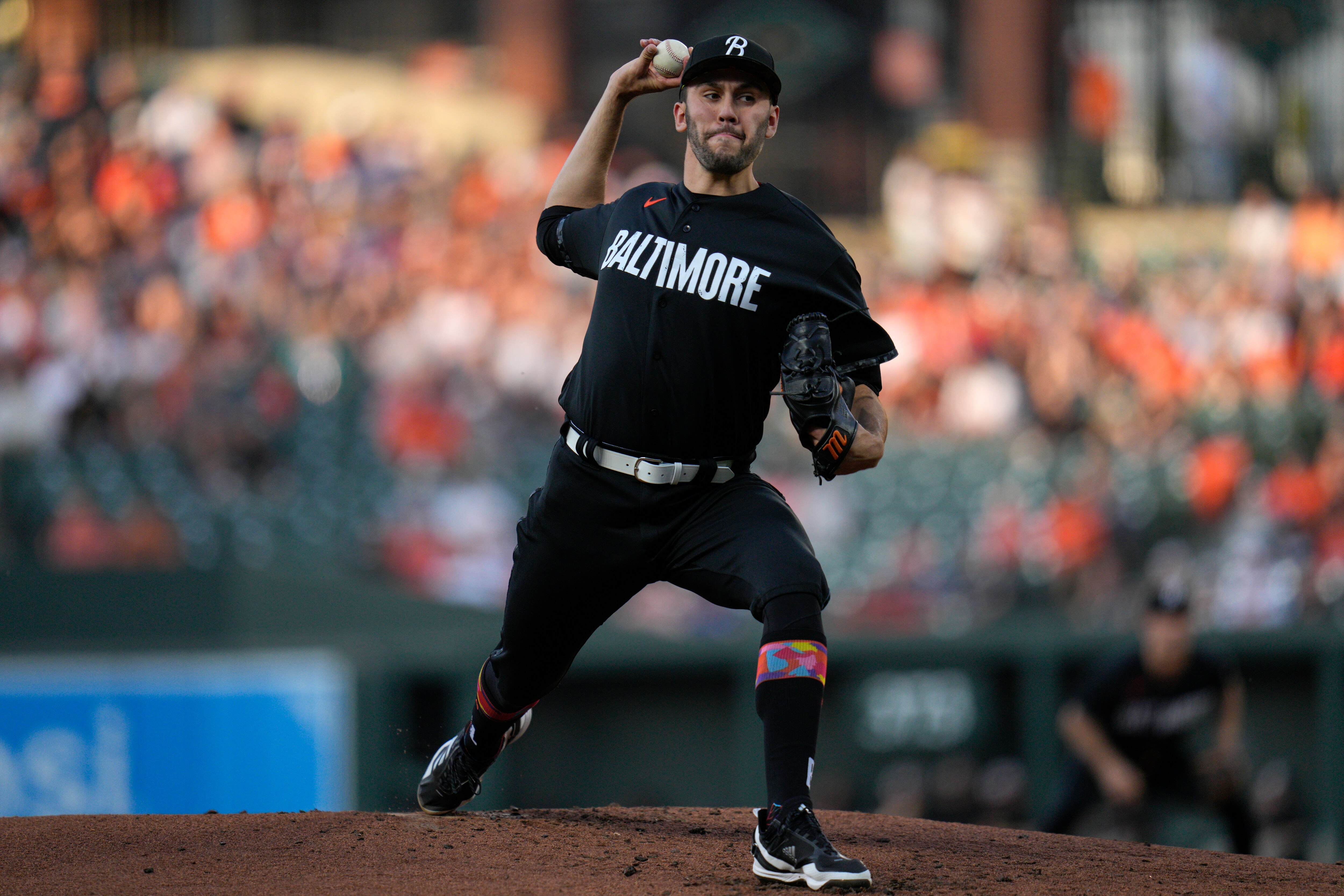 Grayson Rodriguez #30 of the Baltimore Orioles pitches against the Texas Rangers during the first inning at Oriole Park at Camden Yards on May 26, 2023 in Baltimore, Maryland.