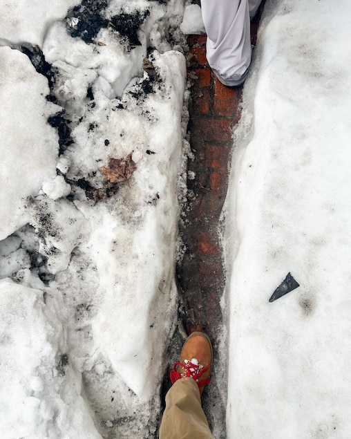 Student Christian Holmes shows her tricky snow-covered walk to catch the bus to and from school.