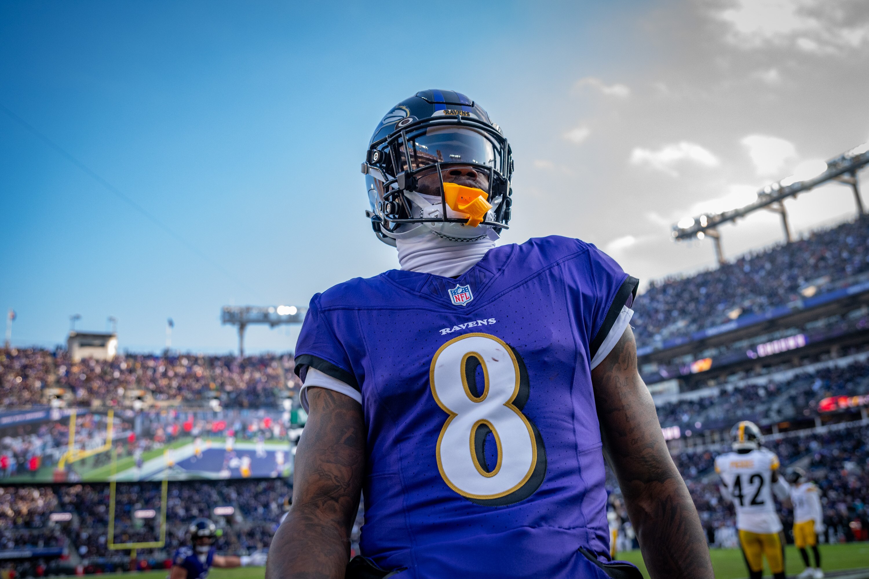 Ravens quarterback Lamar Jackson scores in the second quarter against the Pittsburgh Steelers in Week 14.
