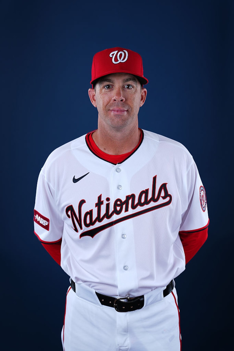 Washington Nationals bullpen coach Dustin Glant poses for a photo during spring training.
