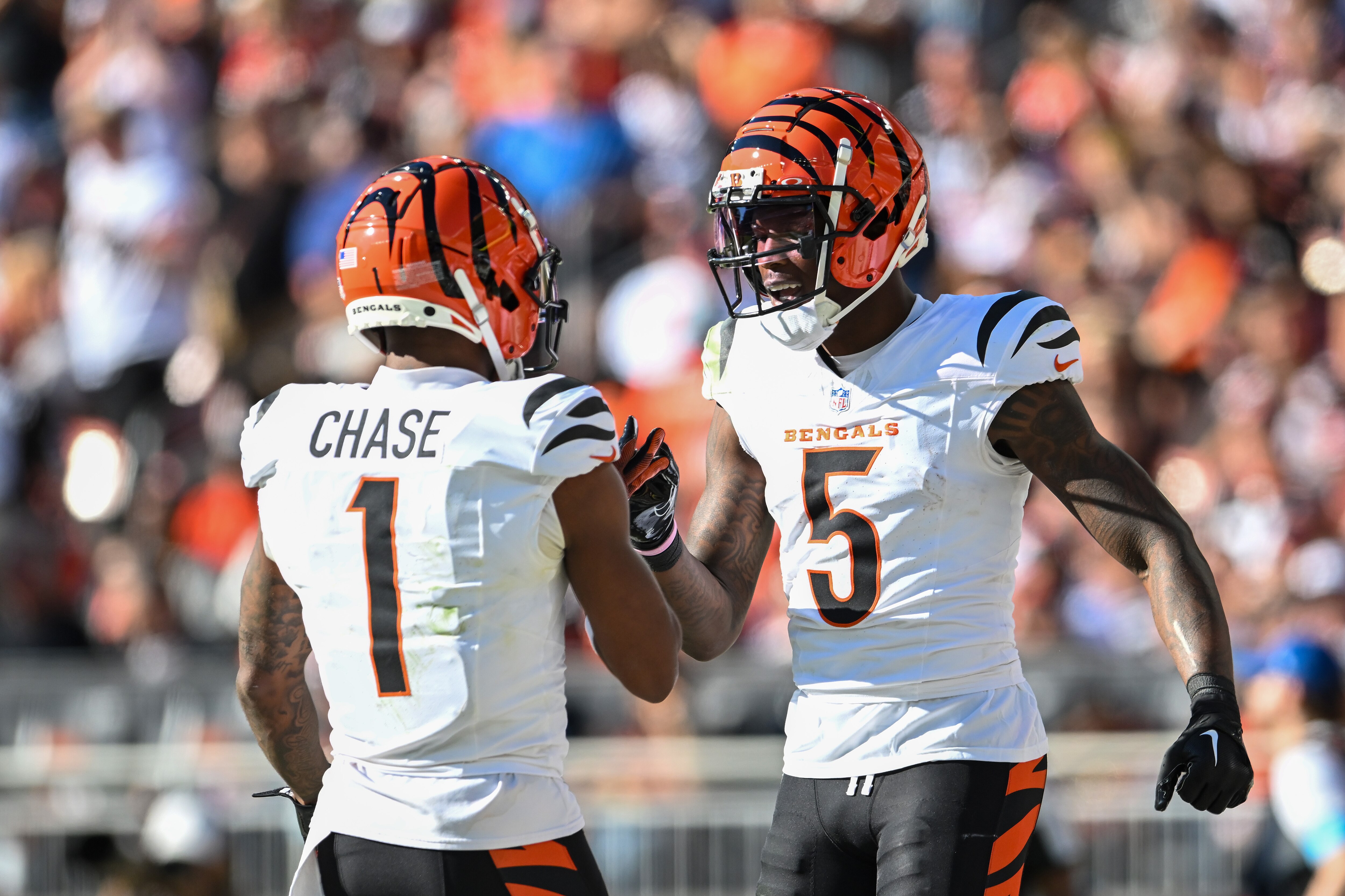 Tee Higgins (right) will not play for the Bengals on Thursday night against the Ravens.