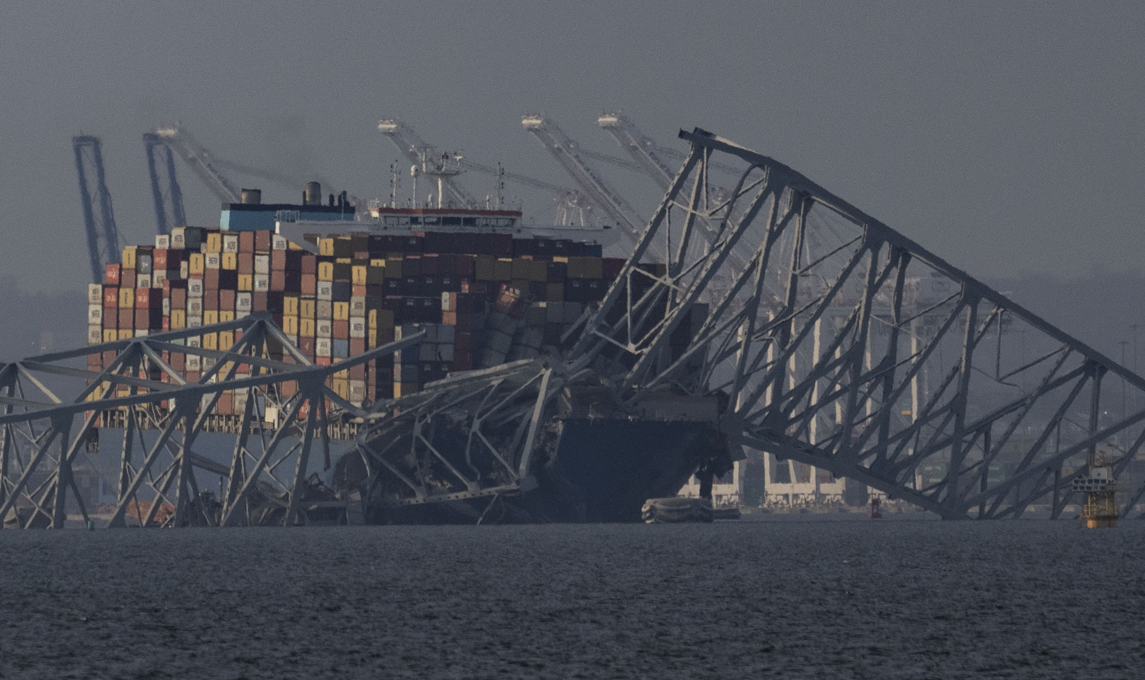 A portion of Baltimore's Francis Scott Key Bridge collapsed after it was struck by a large container ship early Tuesday morning, March 26, 2024, sending several vehicles and people into the frigid water below.