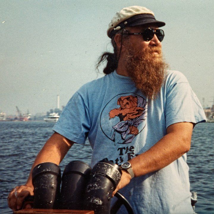 Dik Souan aboard his boat, the Hot Rubber, in the Baltimore harbor.