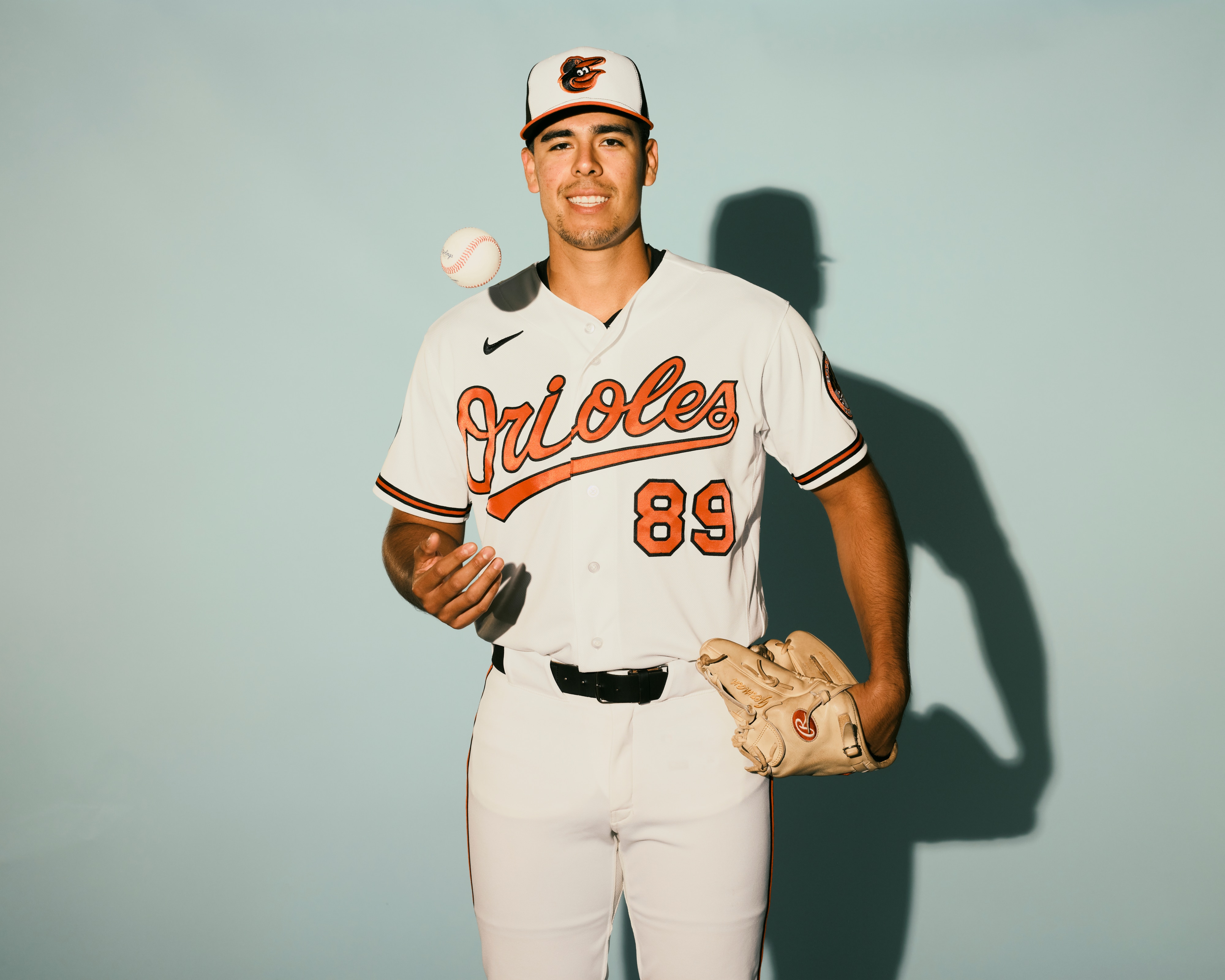 Orioles pitching prospect Nestor German poses for a portrait during media day at spring training.