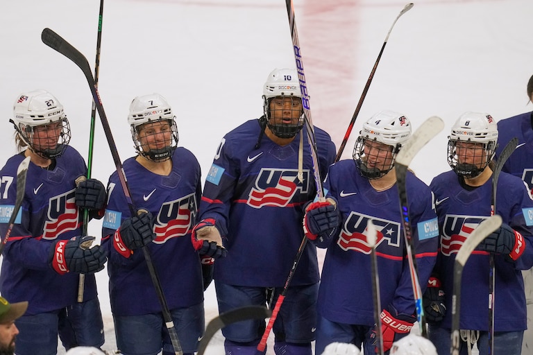 US's Taylor Heise (27), Lacey Eden (7), Laila Edwards (10) Caroline Harvey (4) and Haley Winn (8) celebrate with teammates after the US defeated Canada in a Rivalry Series women's hockey game Thursday, Nov. 6, 2025, in Cleveland. (AP Photo/Sue Ogrocki)