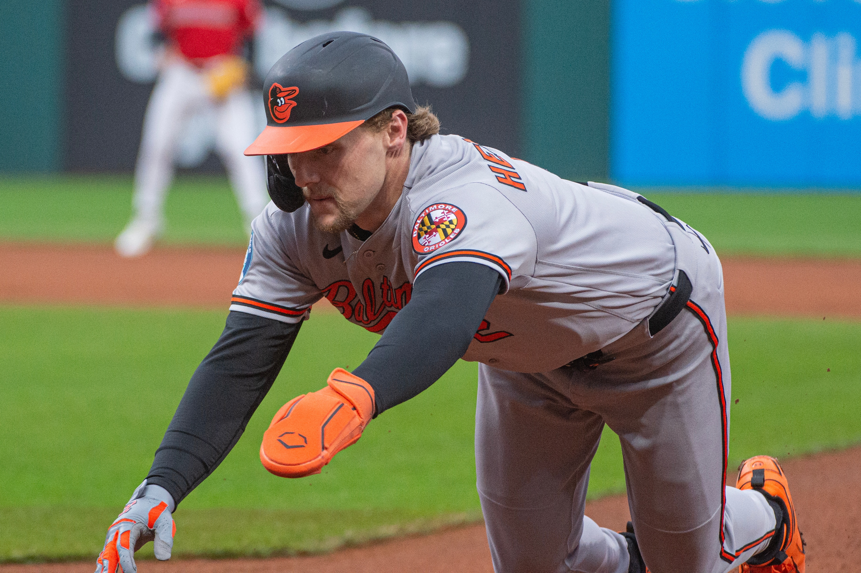 Gunnar Henderson dives back to first base during the first inning of a game against the Cleveland Guardians on April 18.