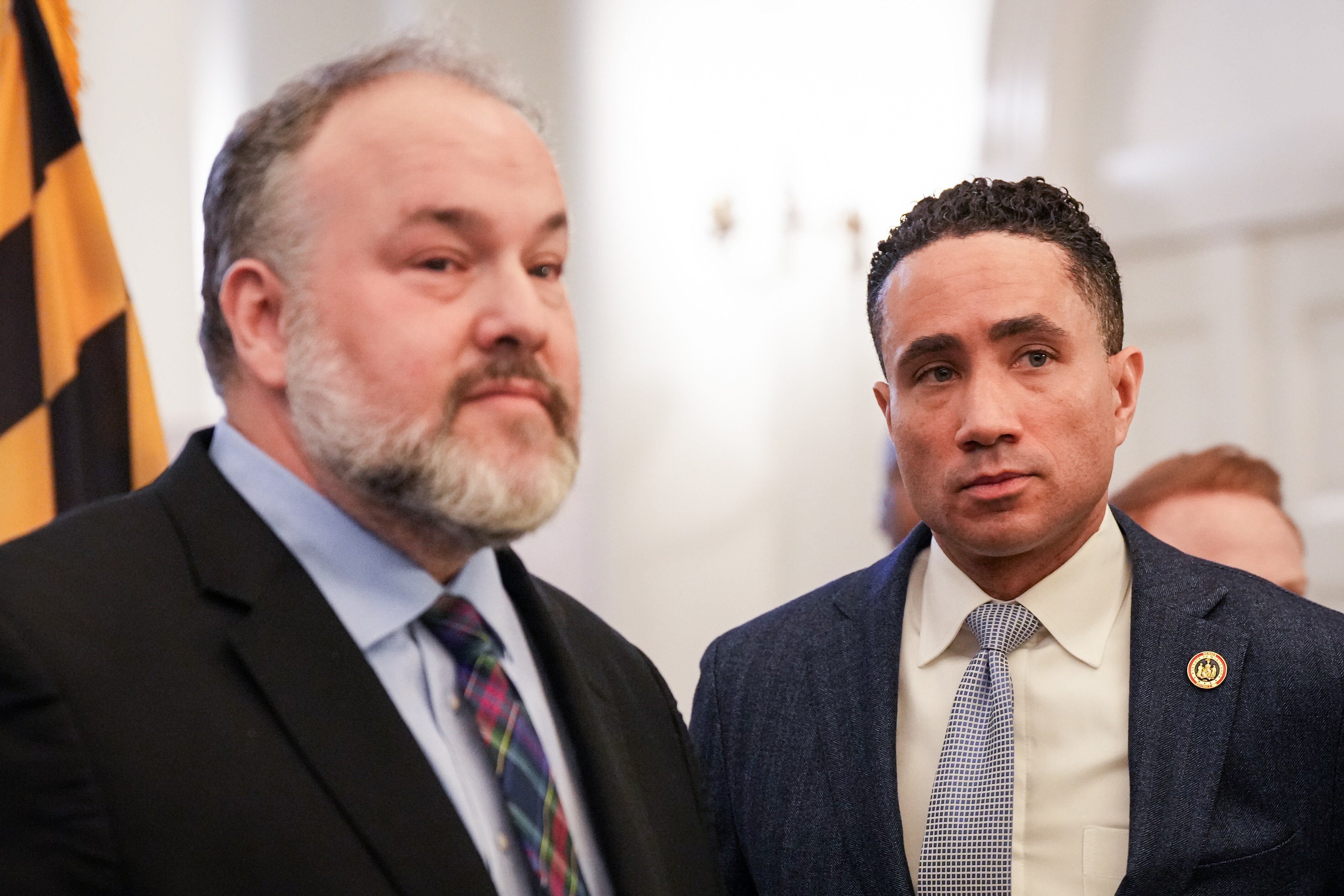 Del. Luke Clippinger, chairman of the House Judiciary Committee, and Sen. Will Smith, chairman of the Senate Judicial Proceedings Committee, speak with reporters following a news conference announcing new juvenile justice legislation in the Maryland State House lobby on Jan. 31, 2024.
