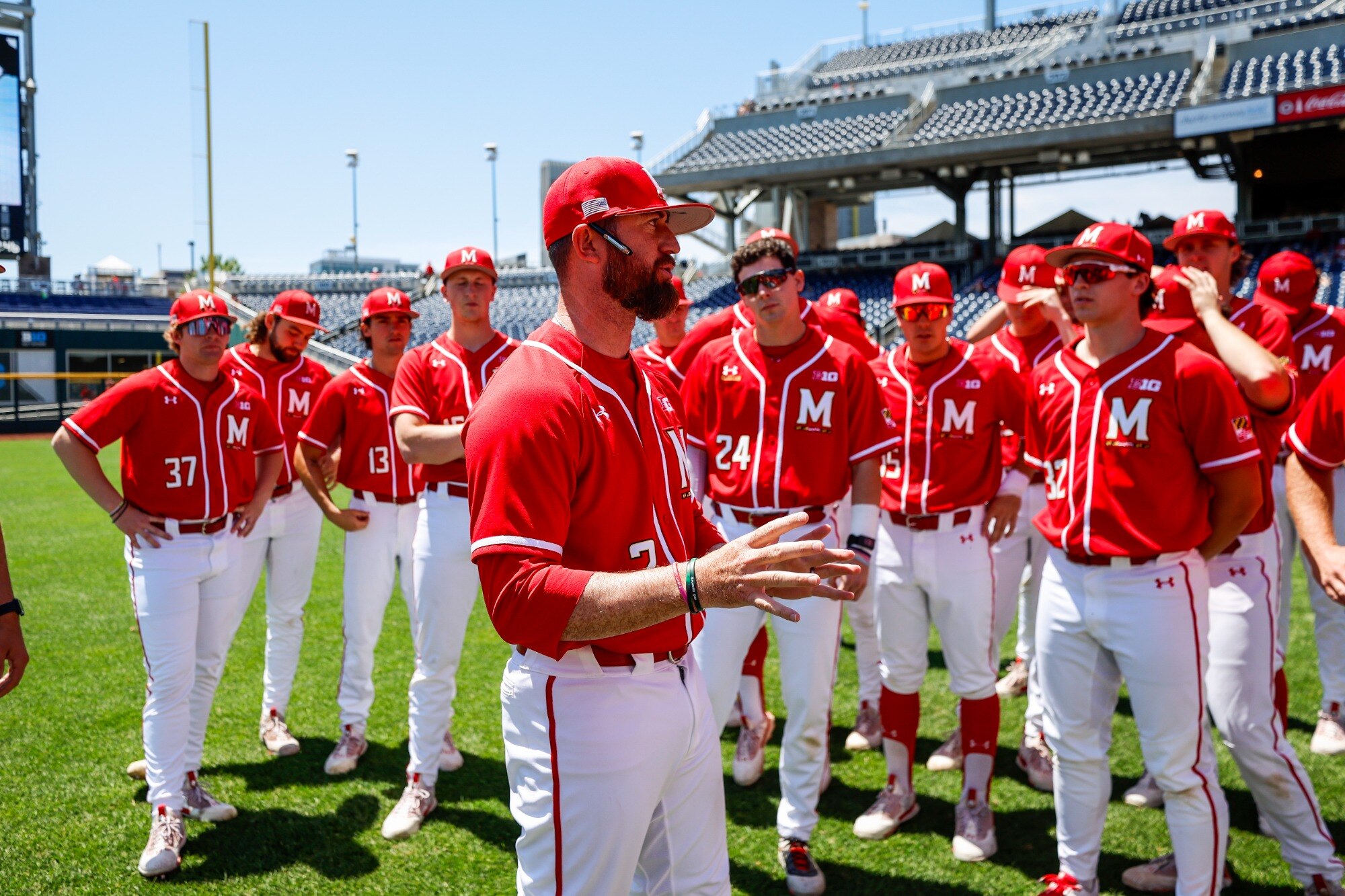 Head coach Rob Vaughn addresses his team during the Big Ten Tournament in Omaha, Nebraska.
