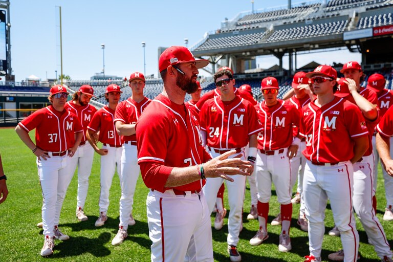 Head coach Rob Vaughn addresses his team during the Big Ten Tournament in Omaha, Nebraska.