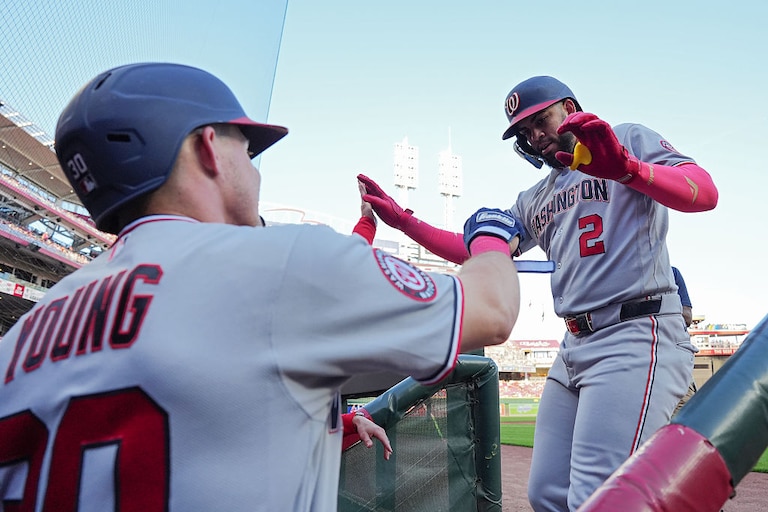 Jacob Young, left, and Luis García Jr. of the Washington Nationals celebrate after García Jr. hit a home run during the second inning.