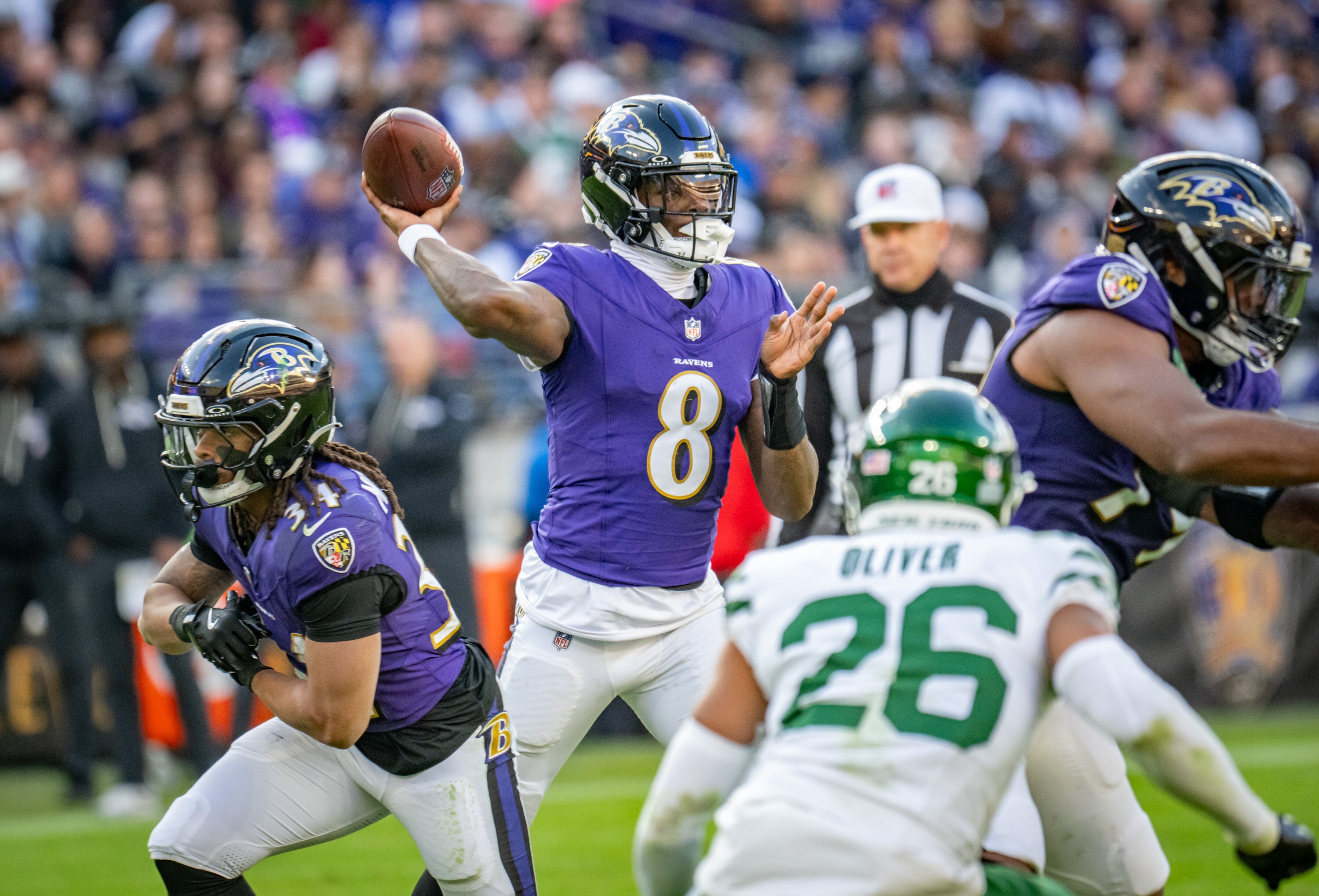 Baltimore Ravens quarterback Lamar Jackson looks for a target downfield in the fourth quarter against the New York Jets in November.