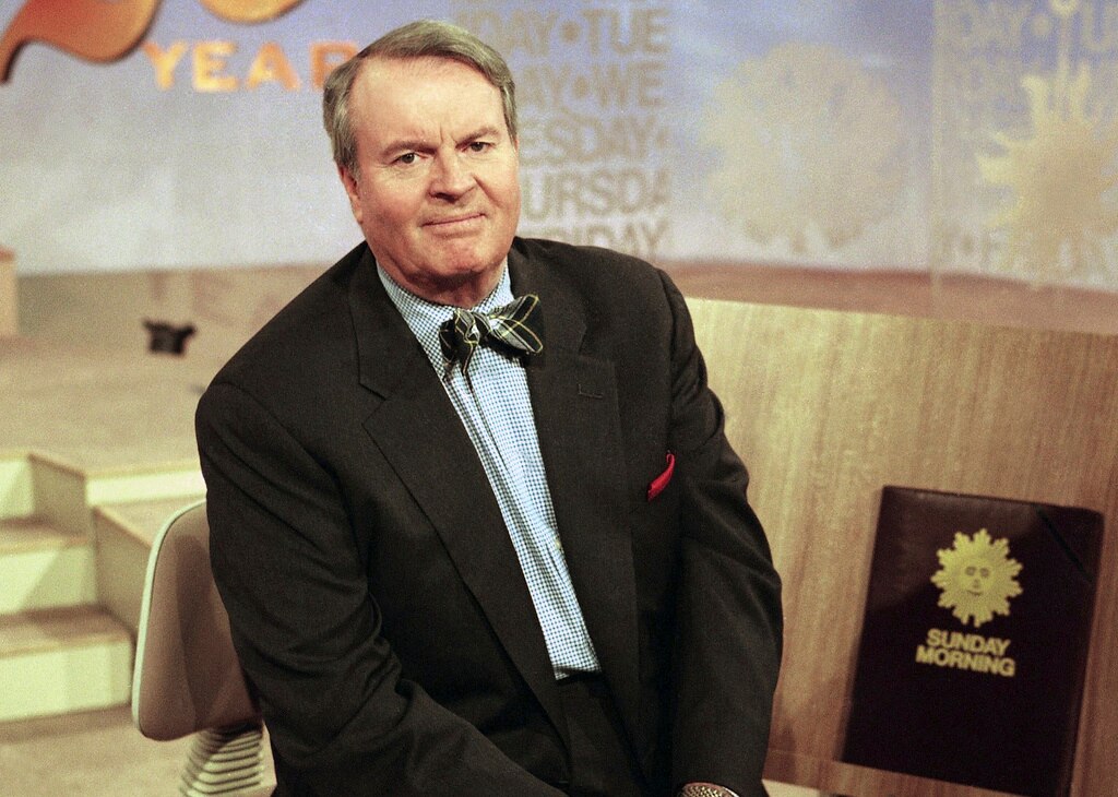 FILE - Charles Osgood, anchor of CBS's "Sunday Morning," poses for a portrait on the set in New York on March 28, 1999.  Osgood, who anchored the popular news magazine's for more than two decades, was host of the long-running radio program “The Osgood File” and was referred to as CBS News’ poet-in-residence, has died. He was 91. (AP Photo/Suzanne Plunkett, File)