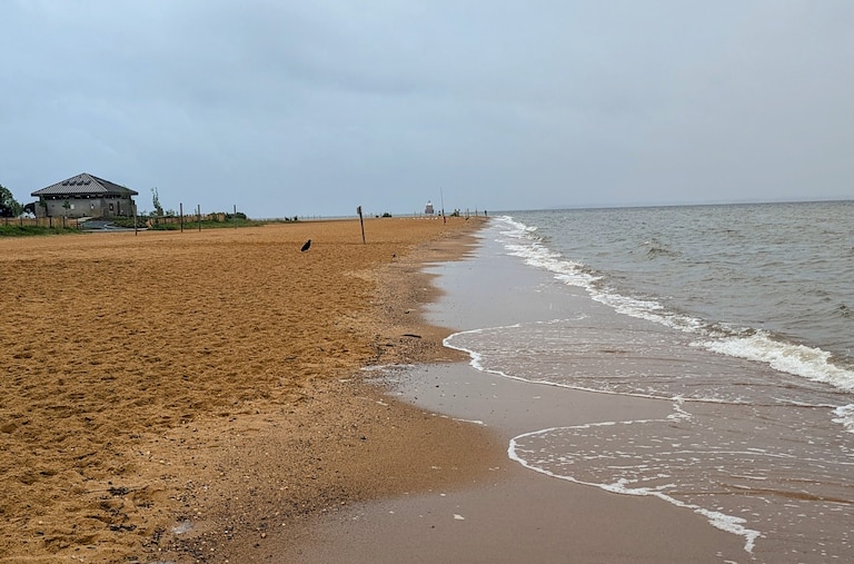 The sand at Sandy Point State Park is ochre, a color caused by the presence of iron ore.