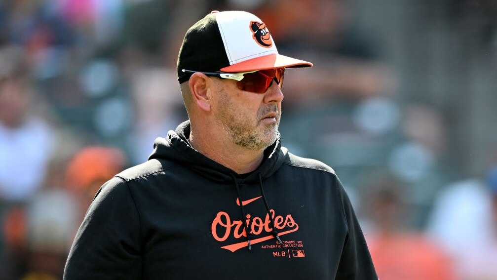 BALTIMORE, MARYLAND - JULY 28: Manager Brandon Hyde #18 of the Baltimore Orioles walks across the field during the game against the San Diego Padres at Oriole Park at Camden Yards on July 28, 2024 in Baltimore, Maryland. (Photo by G Fiume/Getty Images)