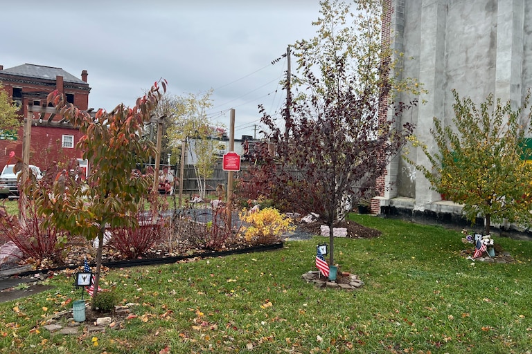 The memorial at the site on Saturday, Nov. 15, 2025, of the deadly 2022 Stricker Street blaze honors three Baltimore firefighters Lt. Kelsey Sadler, Lt. Paul Butrim and EMT/firefighter Kenny Lacayo who died in the blaze.