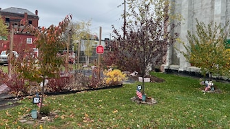 The memorial at the site on Saturday, Nov. 15, 2025, of the deadly 2022 Stricker Street blaze honors three Baltimore firefighters Lt. Kelsey Sadler, Lt. Paul Butrim and EMT/firefighter Kenny Lacayo who died in the blaze.