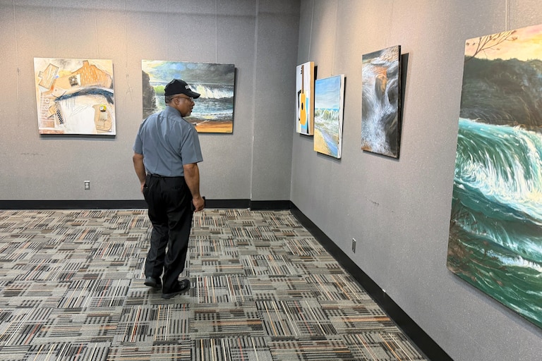 Mylar “Nick” Liggins is a Fort Washington-based artist who has works on display at the Oxon Hill Branch Library, the same place where he works as a security guard.