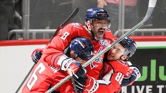 Washington Capitals left wing Alex Ovechkin (8) celebrating his 894th career NHL goal with teammates during the third period of an NHL hockey game against the Chicago Blackhawks, Friday, April 4, 2025, in Washington.