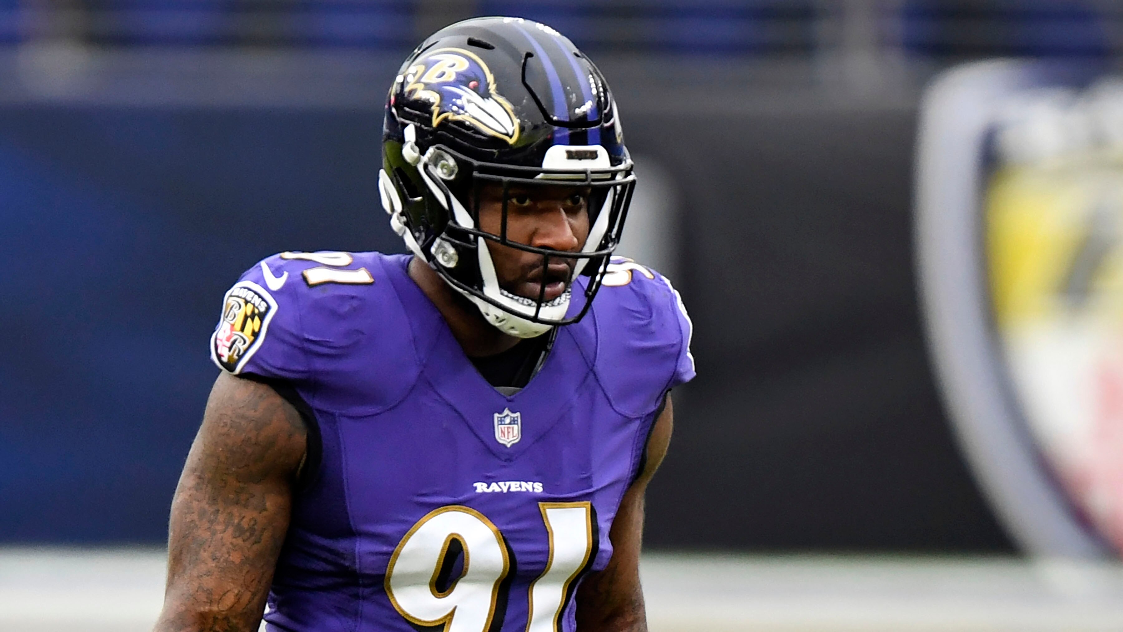 FILE - Baltimore Ravens defensive end Yannick Ngakoue looks on during the second half of an NFL football game against the Jacksonville Jaguars, Dec. 20, 2020, in Baltimore. (AP Photo/Terrance Williams, File)
