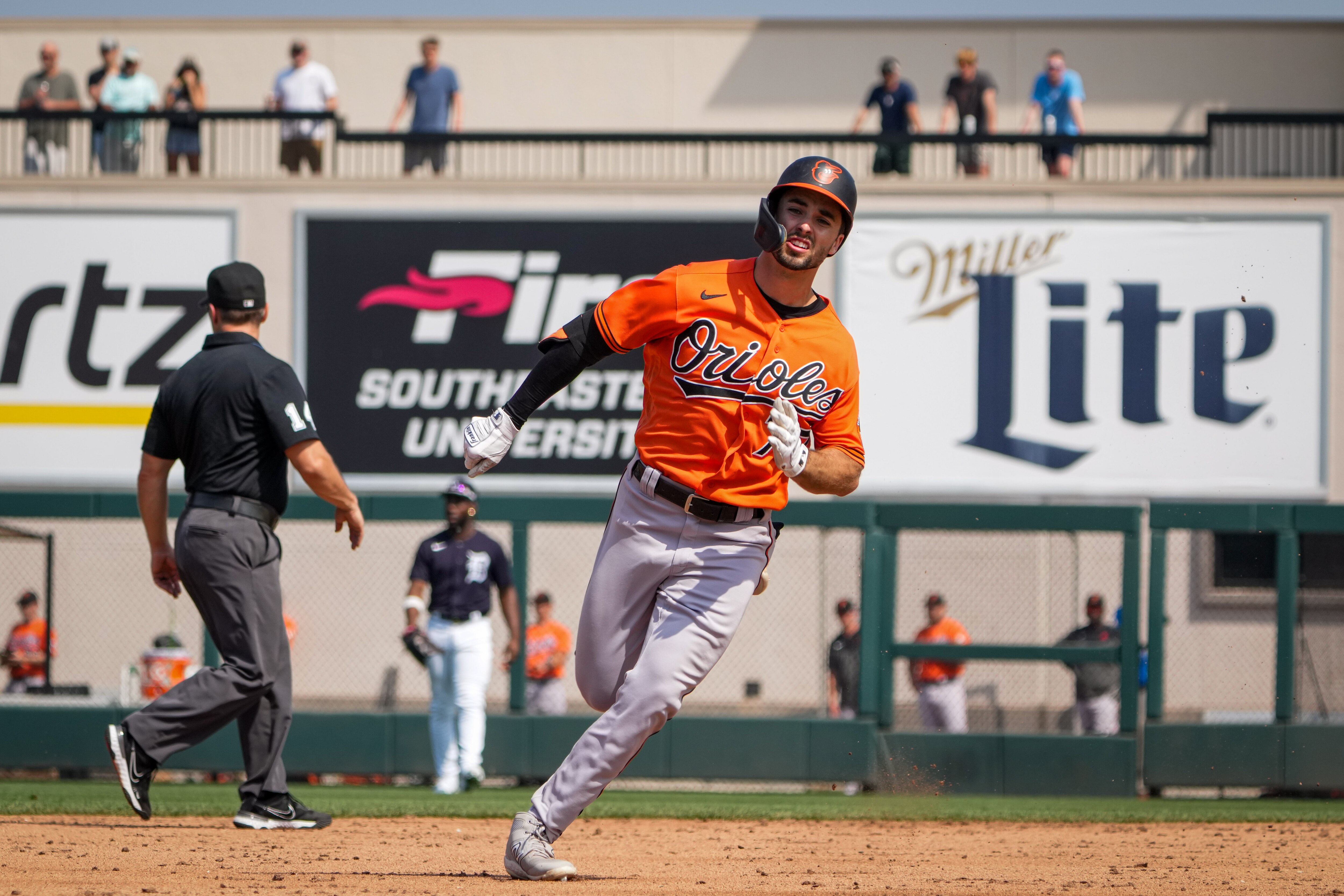 Terrin Vavra (77) rounds the bases at Publix Field at Joker Marchant Stadium after tripling during the fourth inning of a game against the Detroit Tigers on 3/2/23. The Baltimore Orioles traveled to Lakeland to play the Tigers in the Florida Grapefruit League.