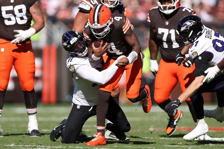CLEVELAND, OHIO - OCTOBER 18: Deshaun Watson #4 of the Cleveland Browns runs the ball against Ethan Burke #97 of the Baltimore Ravens during the third quarter of the game at Huntington Bank Field on October 18, 2026 in Cleveland, Ohio. (Photo by Gregory Shamus/Getty Images)