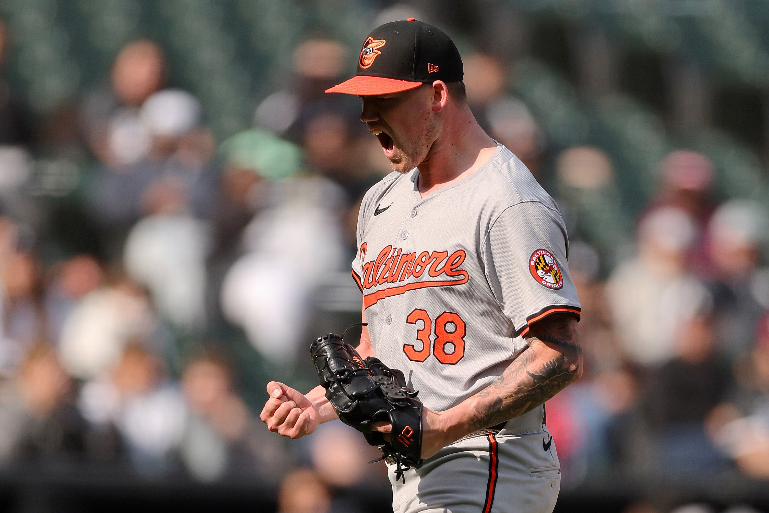 Kyle Bradish, #38 of the Baltimore Orioles, celebrates after striking out Bryan Ramos, #44 of the Chicago White Sox, during the seventh inning on May 26. (Photo by Michael Reaves/Getty Images)