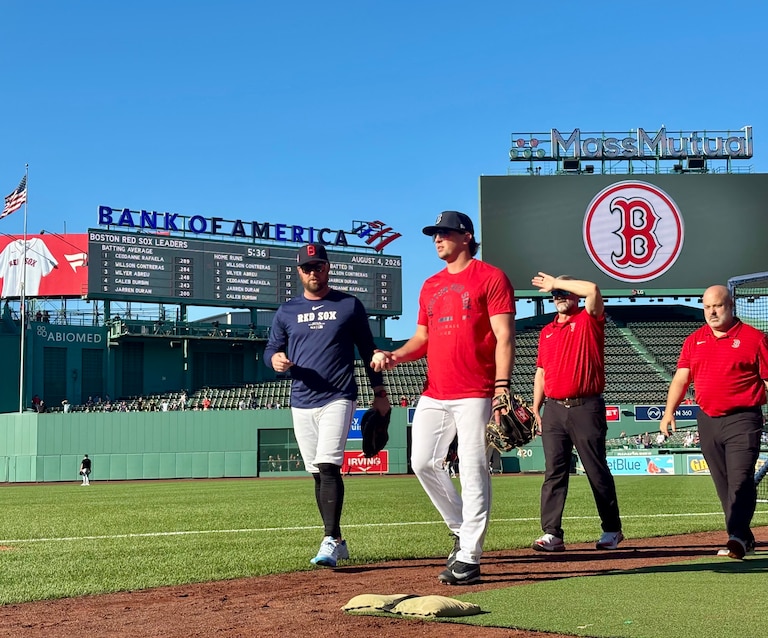 Catcher Adley Rutschman, whom the Orioles traded to the Red Sox on Monday, walks off the field at Fenway Park on Tuesday.