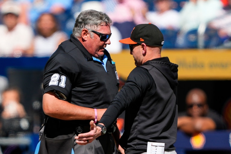 Craig Albernaz #55 of the Baltimore Orioles speaks with umpire Hunter Wendelstedt #21 during the eighth inning at Rogers Centre on June 7, 2026 in Toronto, Canada.