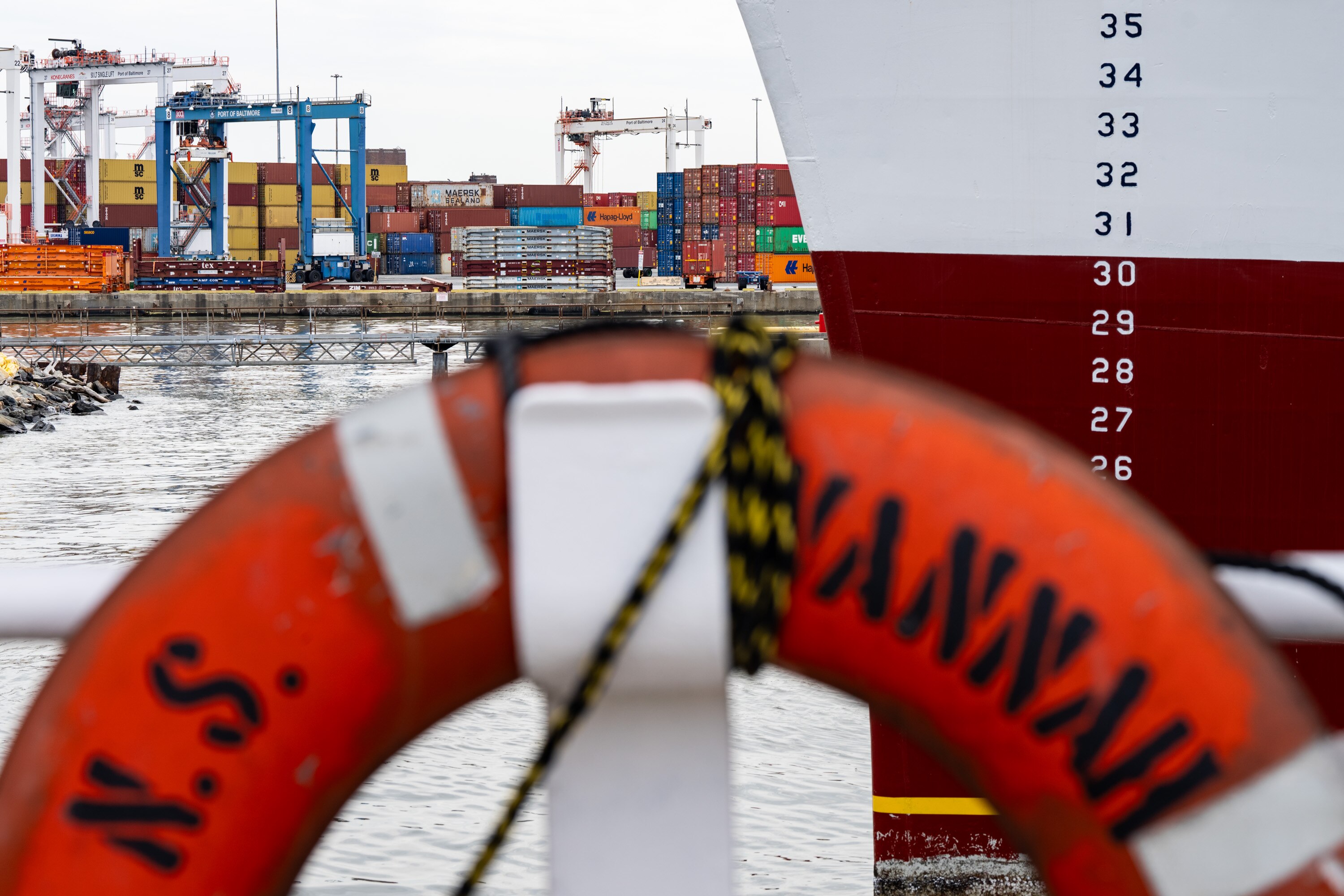 The Port of Baltimore’s Seagirt Marine Terminal is seen behind a flotation device on the NS Savannah on Tuesday, April 9, 2024.