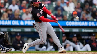 Washington Nationals' Yohandy Morales hits a two-run home run against the Detroit Tigers during the sixth inning.