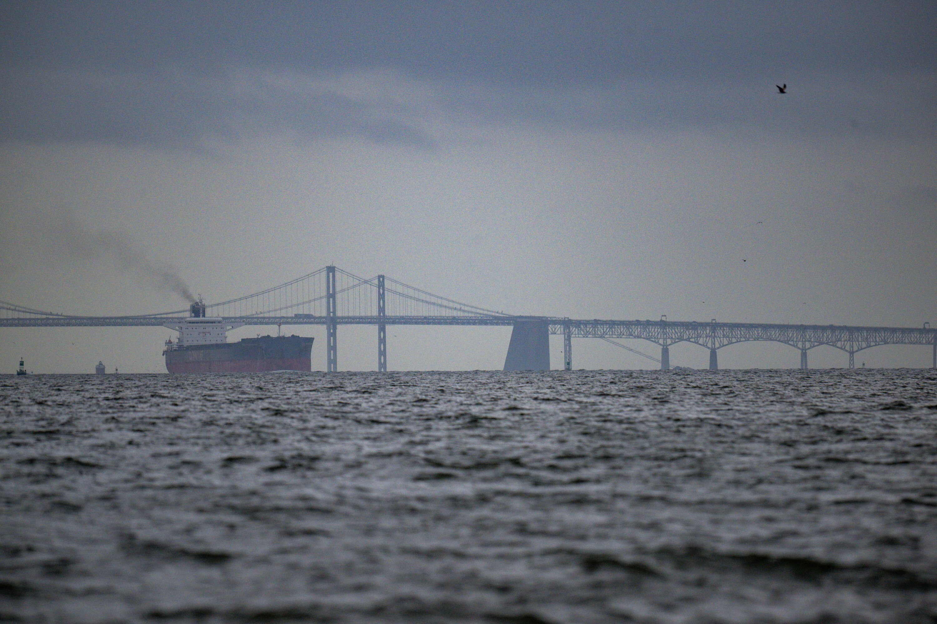 The Chesapeake Bay Bridge is seen as a bulk carrier heads toward the Port of Baltimore.