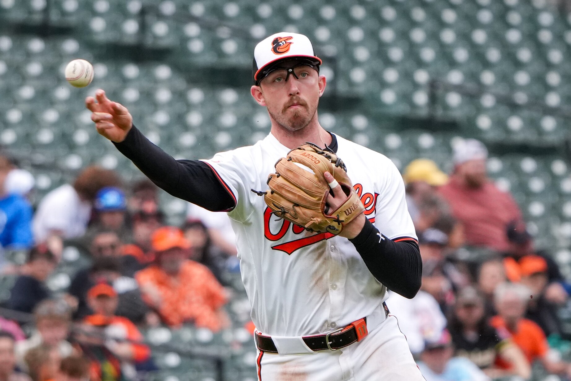 Baltimore Orioles third baseman Jordan Westburg (11) throws to first base during game three of a series against the Minnesota Twins at Camden Yards on April 17, 2024. The Orioles won Wednesday, 4-2, to sweep the series against the Twins.