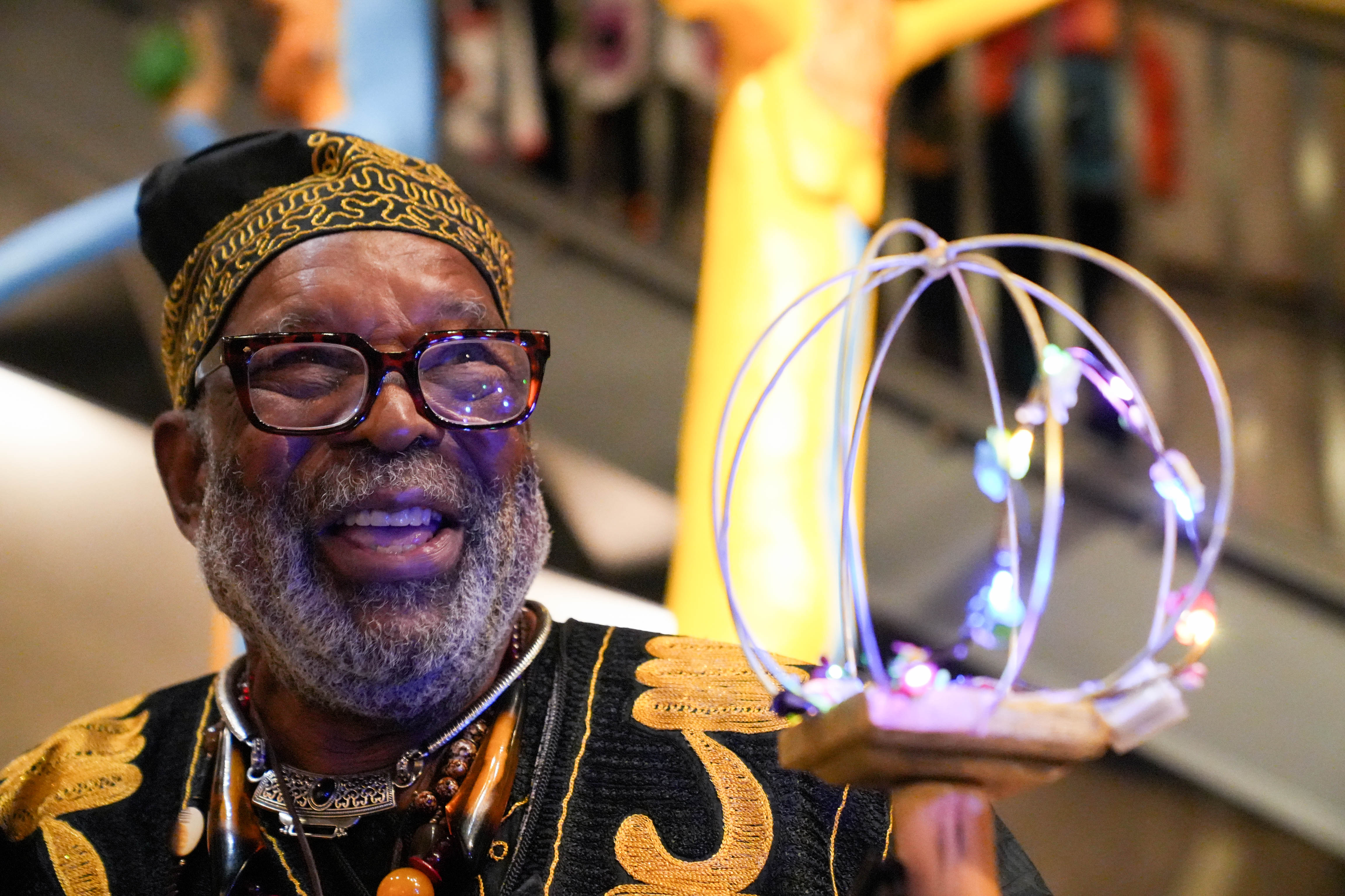 Artist Junius Wilson speaks about his work at Friday's opening of "Fantastic Realties" at the American Visionary Art Museum. Displaying at the museum has been a dream since he began sculpting a decade ago.
