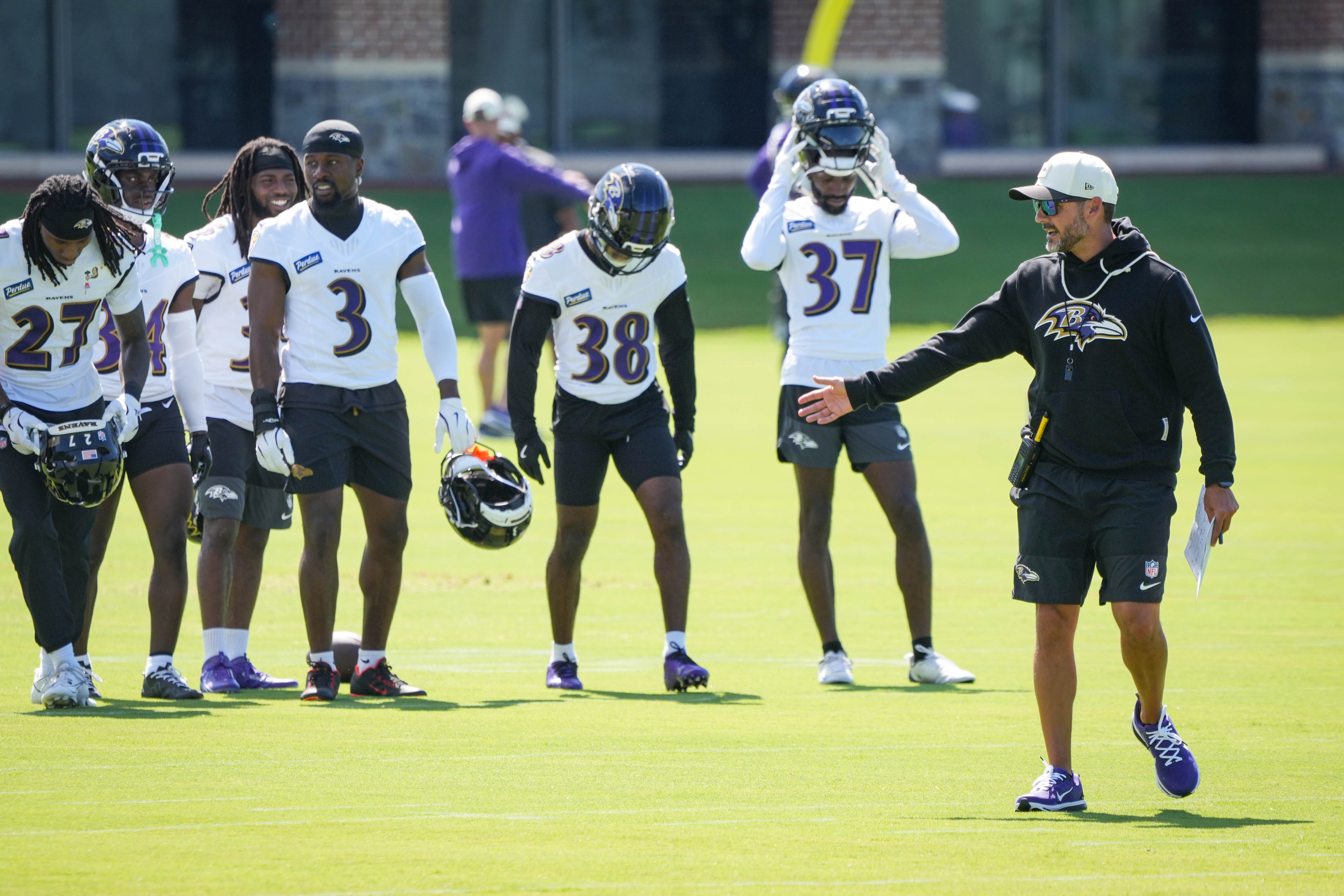 Jesse Minter will call defensive plays and man the challenge flag Saturday night in his first preseason game as an NFL head coach.