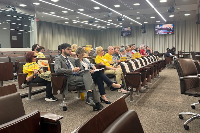 TUESDAY, JULY 28, 2026 - Community members gather in support of an 18-month moratorium on data center development during a Montgomery County Council meeting in Rockville Tuesday.