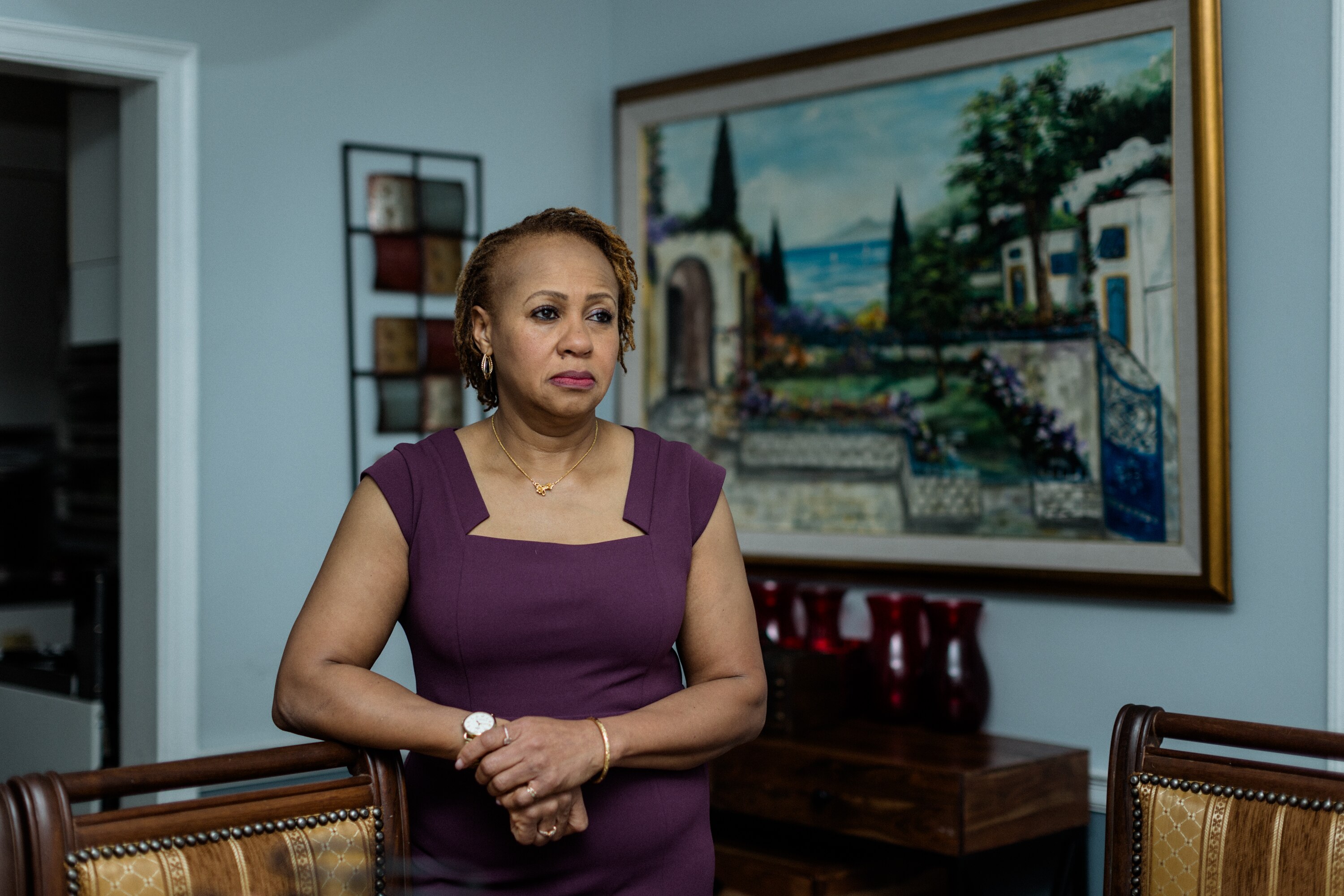 BALTIMORE, MD - DECEMBER 11, 2024: Dr. Ihuoma Emenuga poses for a portrait in her home on December 11, 2024.