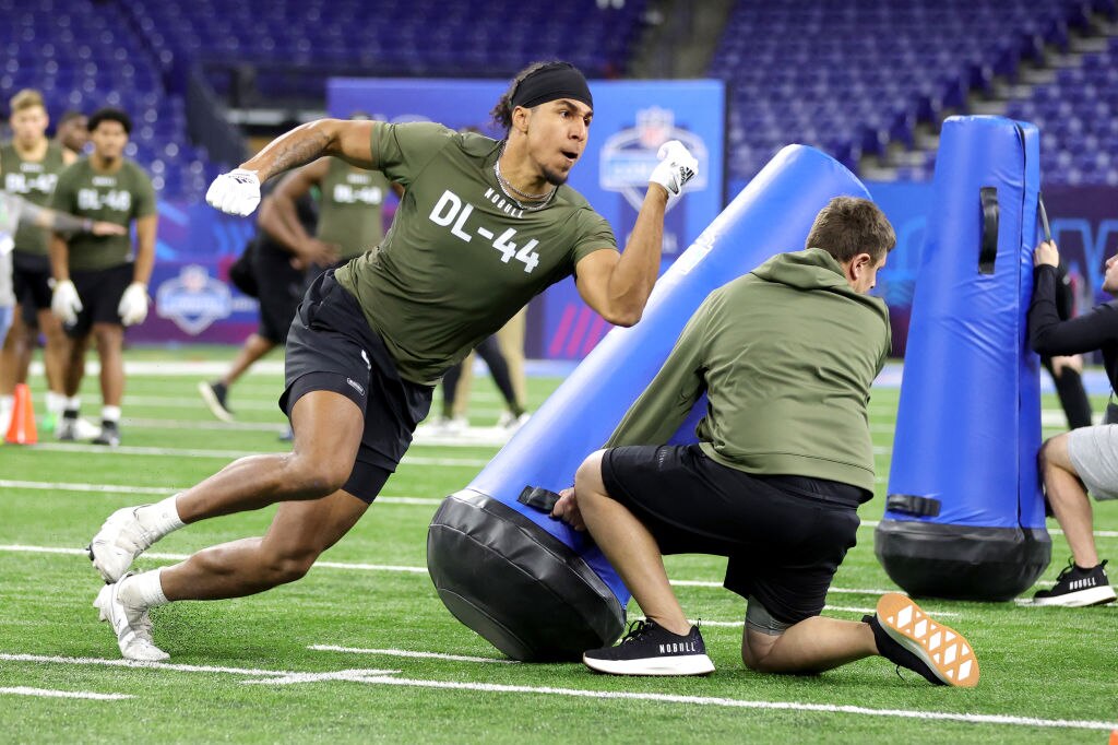 INDIANAPOLIS, INDIANA - MARCH 02: Defensive lineman Tavius Robinson of Mississippi participates in a drill during the NFL Combine at Lucas Oil Stadium on March 02, 2023 in Indianapolis, Indiana. (Photo by Stacy Revere/Getty Images)