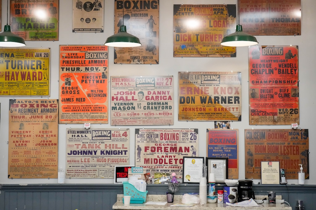 Historic fight posters hang on the wall at the Mack Lewis Boxing Gym in Baltimore, Md. on Tuesday, April 14, 2026.