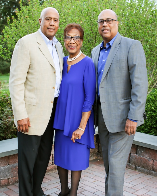 Ellen Dolvey Howard with her sons Larry Howard, left, and Harold Howard, right, during her 90th birthday celebration.